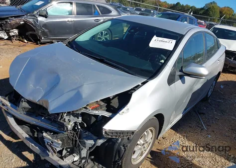 2021 Toyota Prius L Eco z USA, uszkodzony, nr VIN JTDKAMFU9M3143122